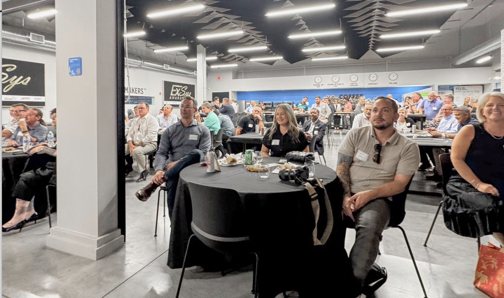 ExSys audience members sitting at tables