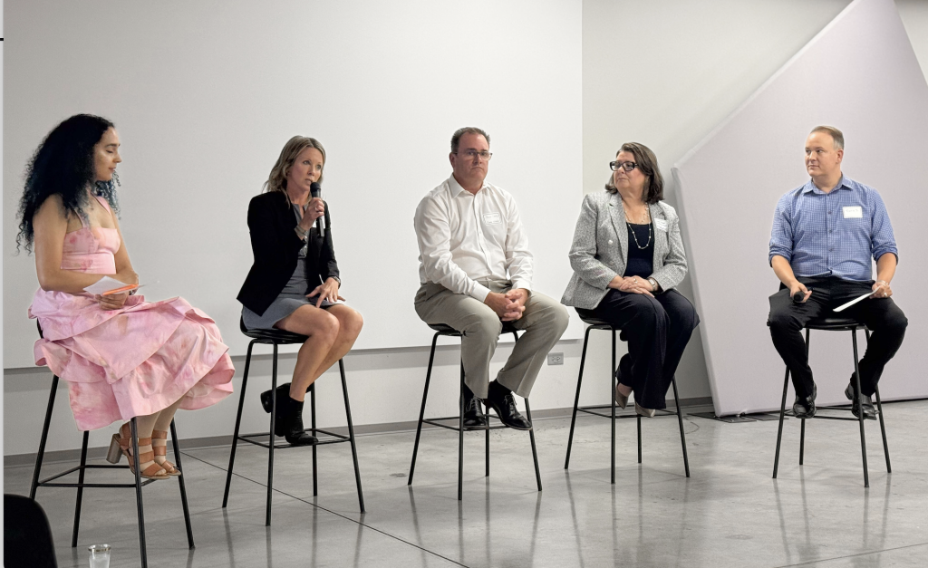 Debbie Parrott speaking on a panel