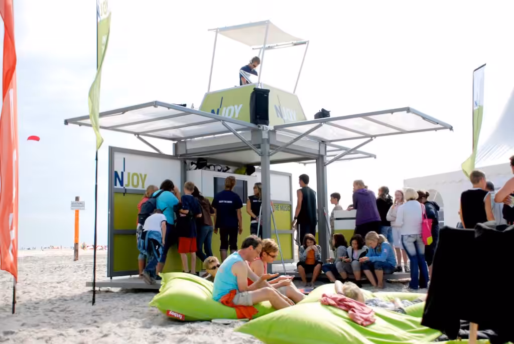 people enjoying mobile structure on the beach